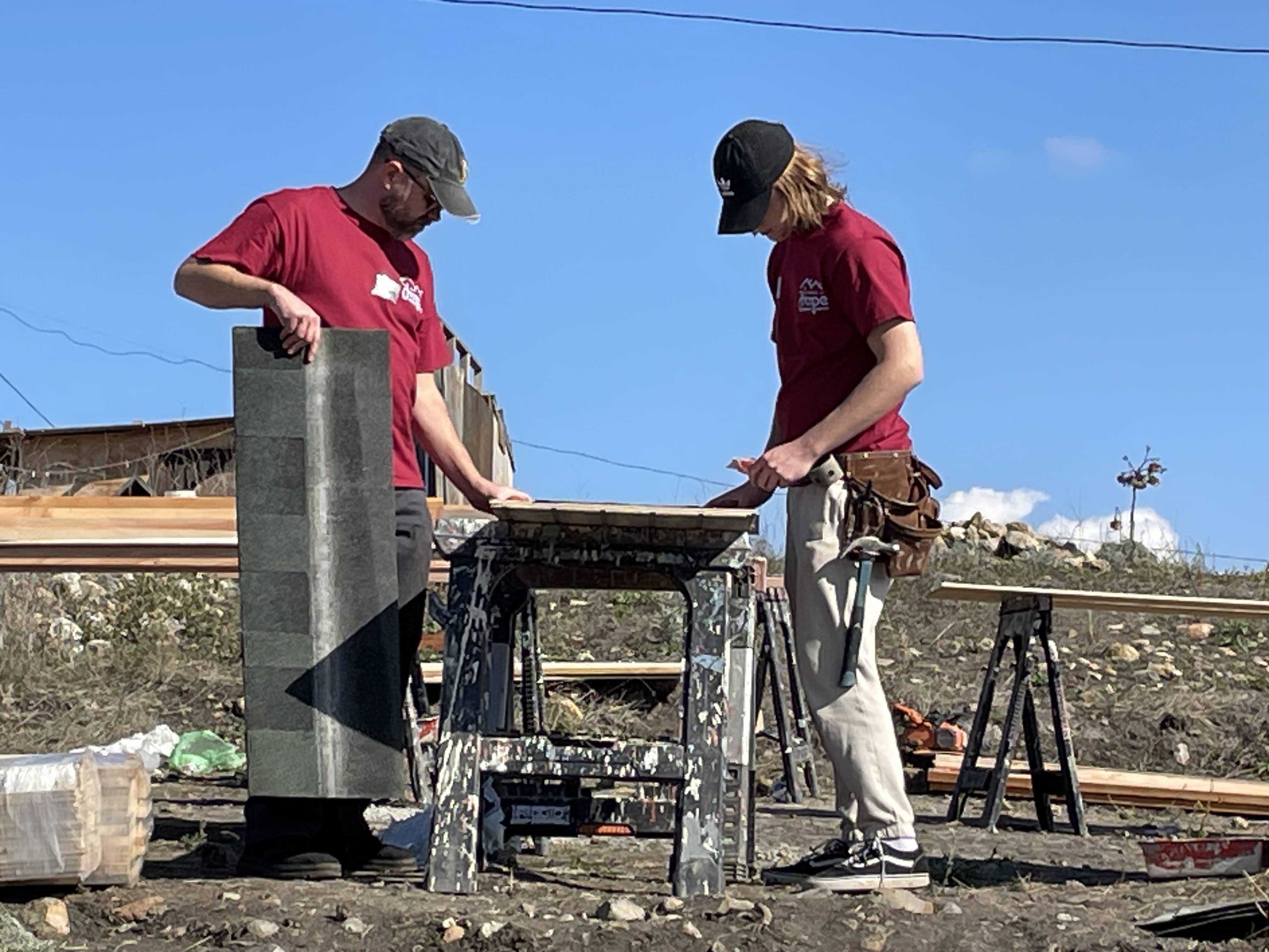 David and Nolan Hermann build homes for YWAM.